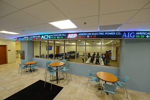 The foyer of the Salerno Center features a stock trading ticker.