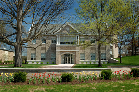 View of Wegmans School of Nursing from the courtyard at St. John Fisher University.