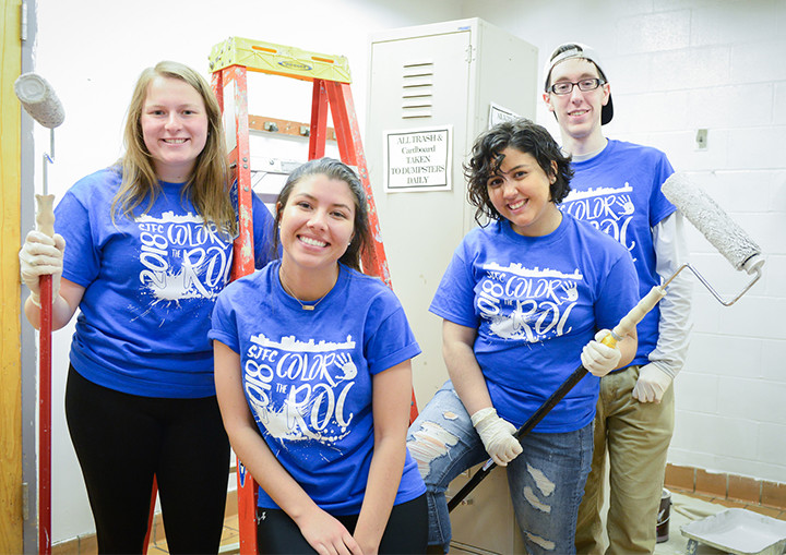 Students with Paint Rollers