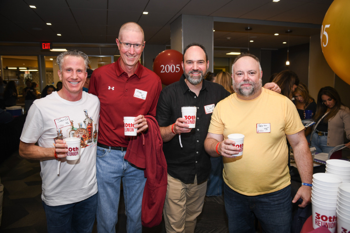 Friends reuniting at their 30th reunion