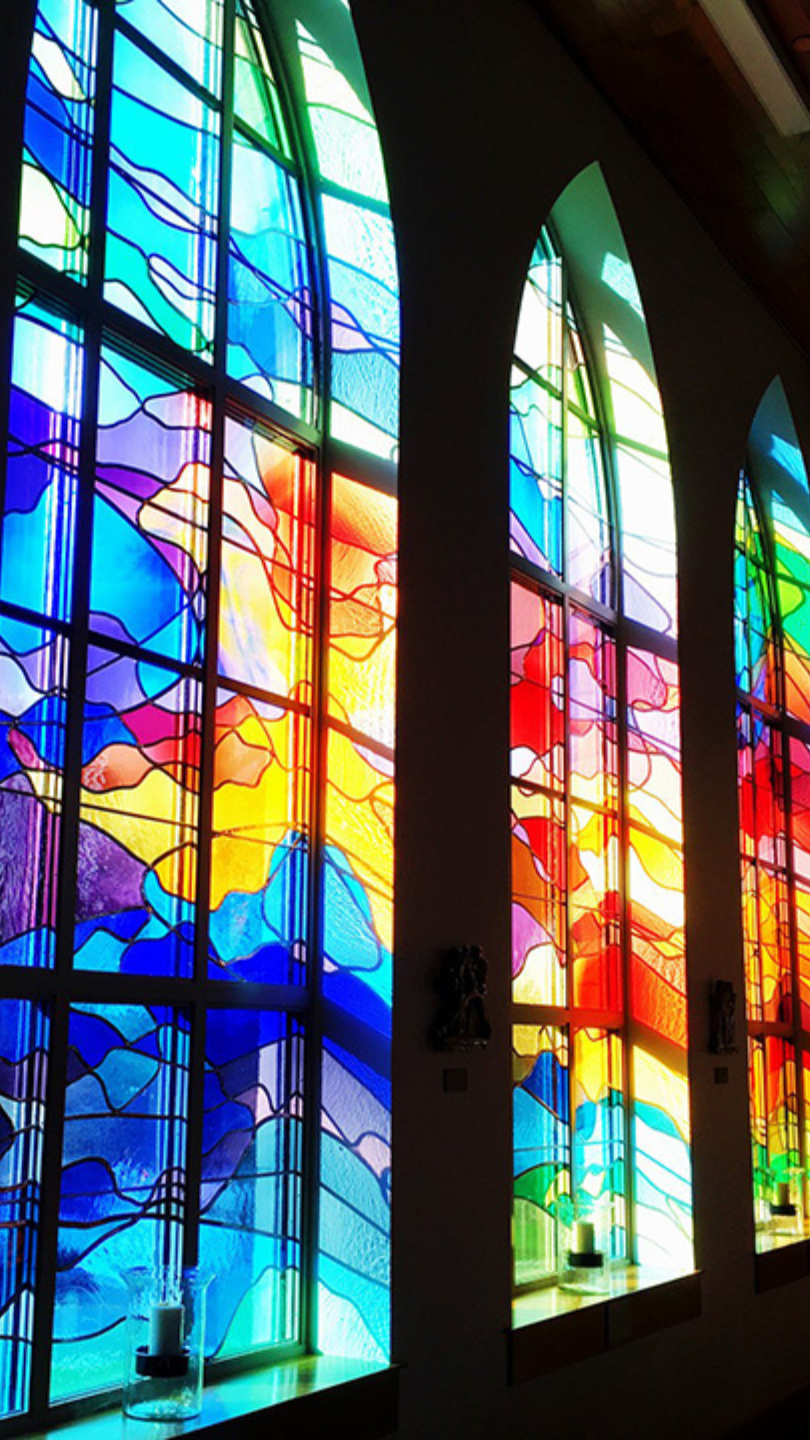 Stained glass windows in Hermance Family Chapel