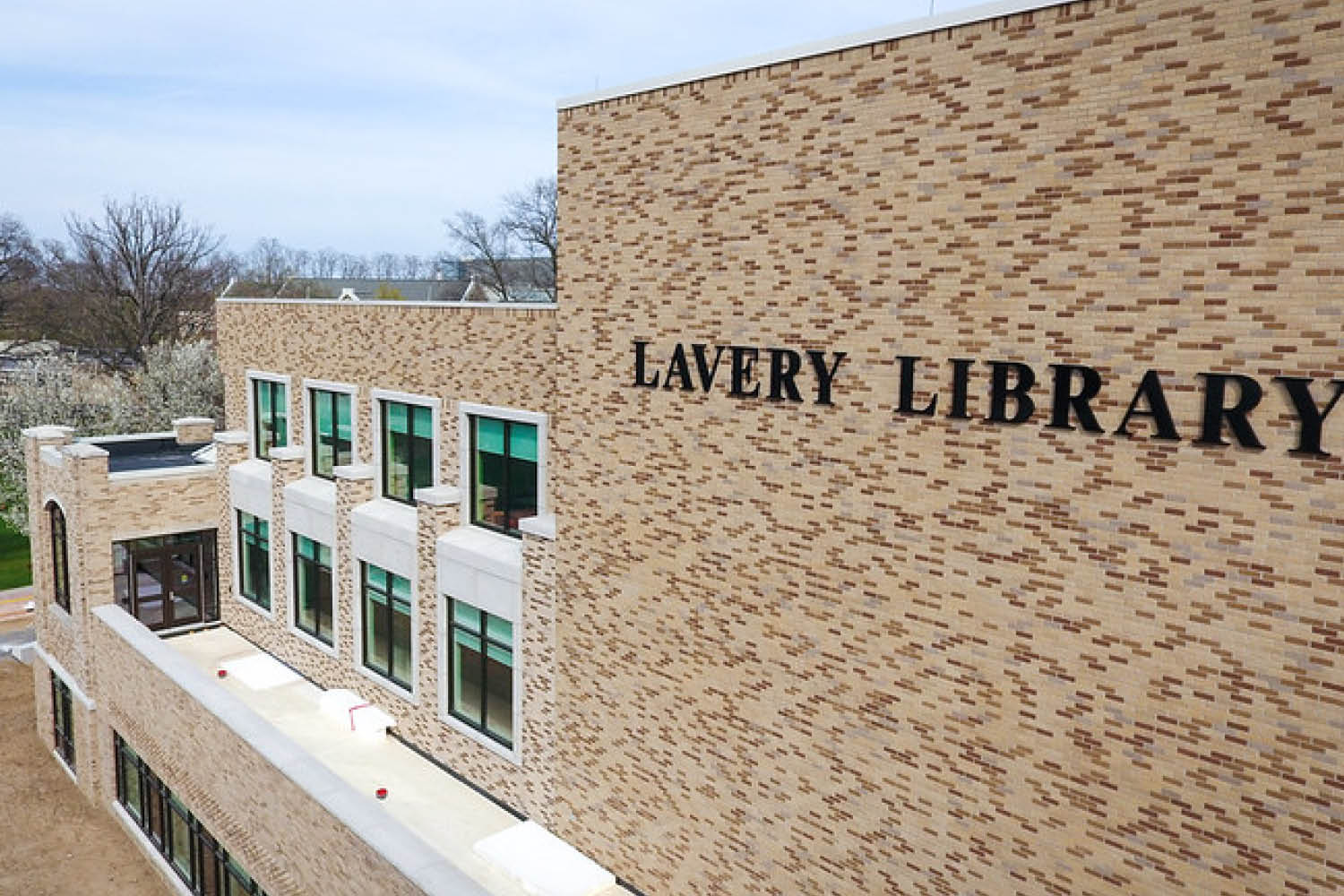Outdoor photo showing progress of Lavery Library renovation, April 2025