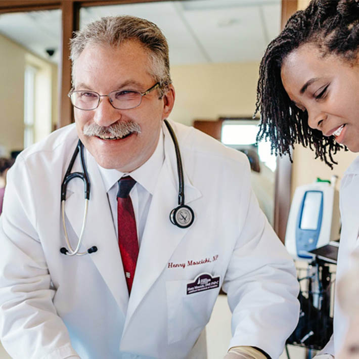 Two nurses working side by side.