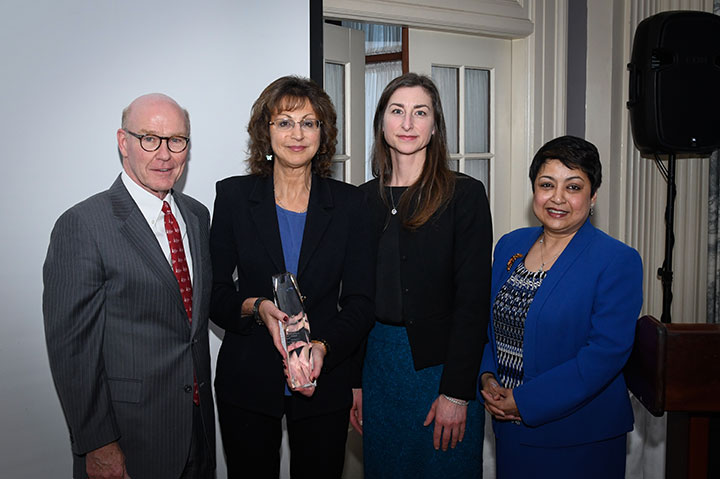 From left to right: President Rooney, Cathy D'Amico, Lori Hollenbeck, and Dean Rama Yelkur.