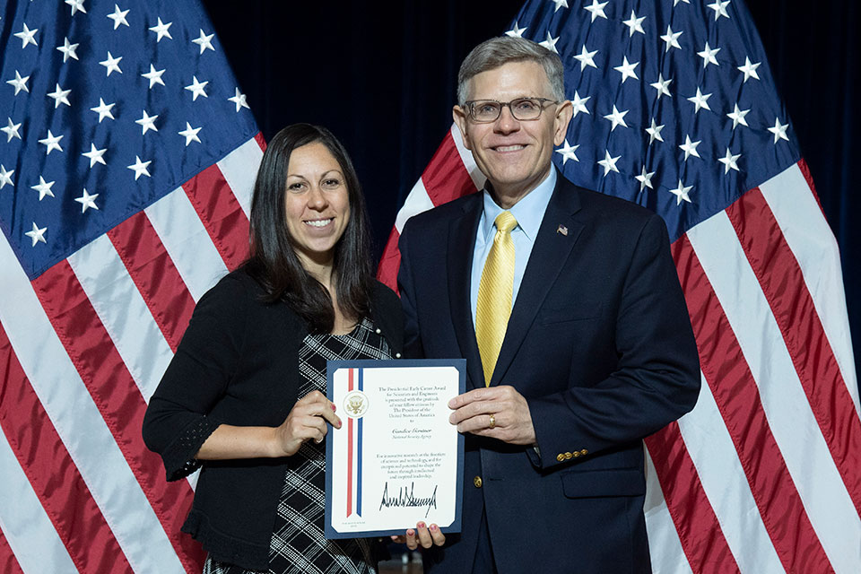 Fisher alumna Dr. Candice Gerstner with Dr. Kelvin K. Droegemeir, director of the White House Office of Science and Technology Policy. (Photo credit: U.S. Department of Energy)