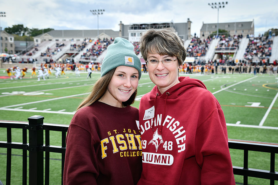 A student and alumna at Family Weekend 2018.