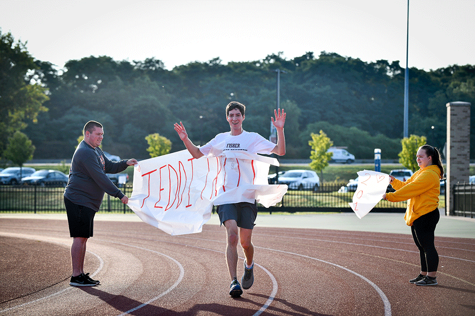 The winner of the 2019 Teddi Trot runs to the finish line.