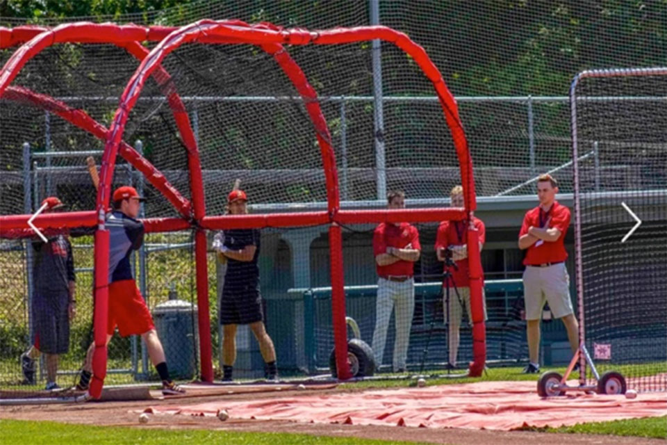 Brandon Smith works with players in the Cape Cod Baseball League.