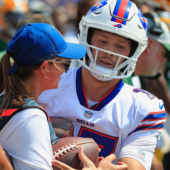 Fisher student Rachel Makowski works with Bills quarterback Josh Allen.