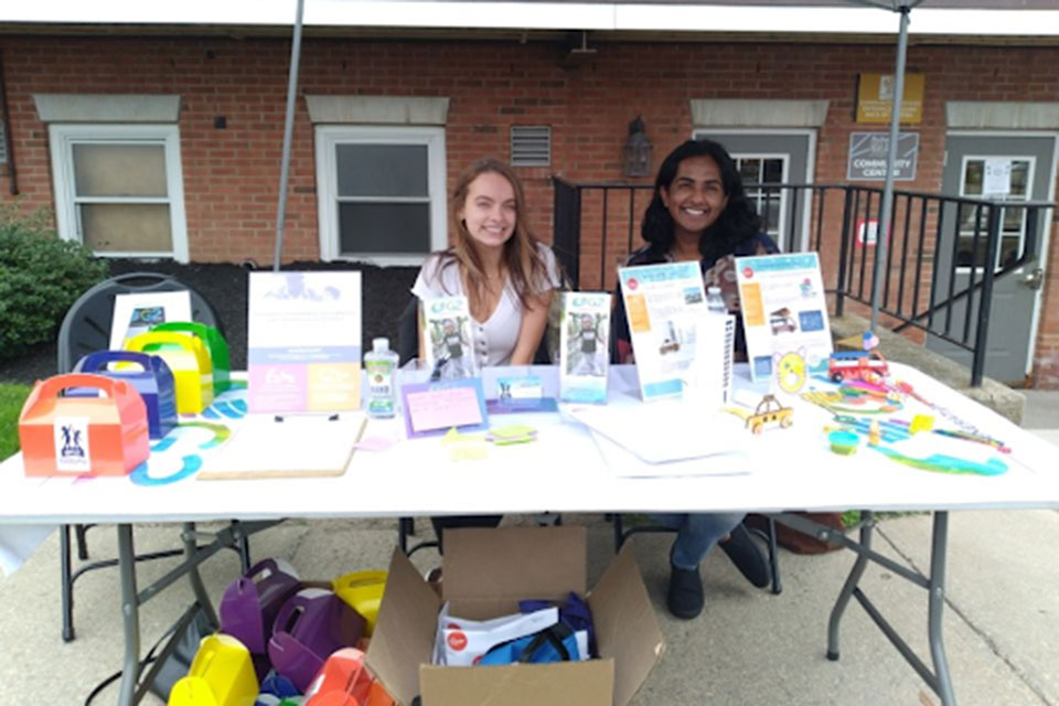 Shannon Munier and a colleague host a table promoting Generation Two.