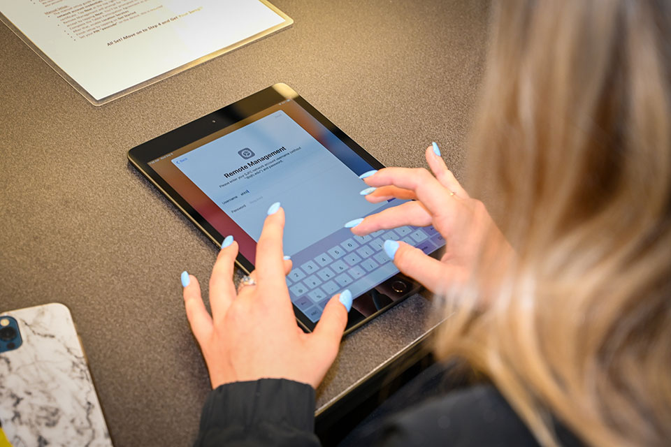 A student uses an iPad.