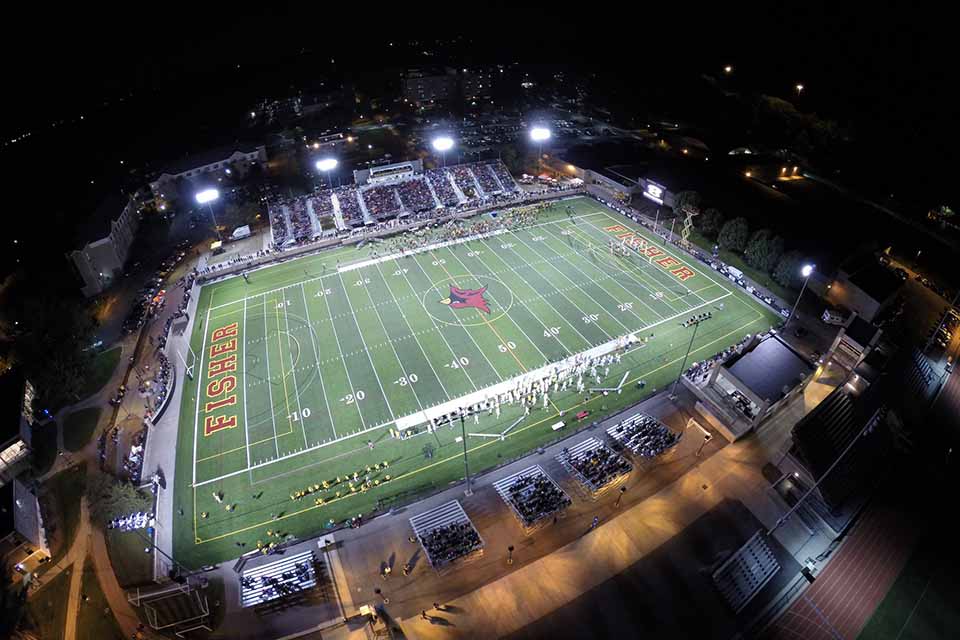 An aerial view of Growney Stadium at night.