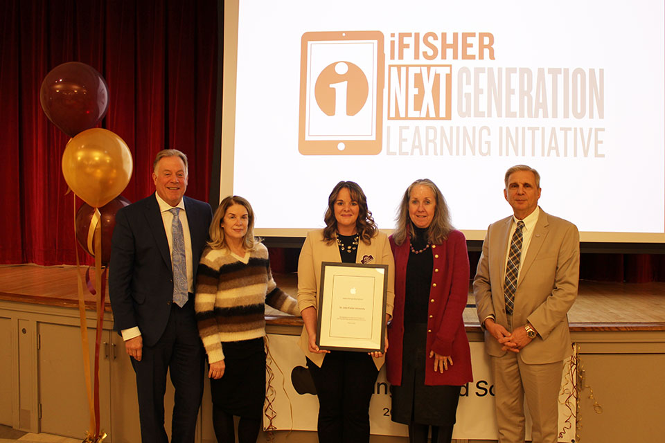 Randy M. '75 and Susan White, Katie Sabourin, Eileen Lynd-Balta, and Kevin Railey.