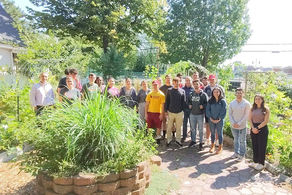 Dr. Clair Smith and his students at Tap Root Collective.