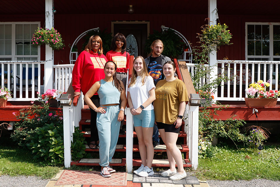 Members of The Vineyard leadership team with students from the Wegmans School of Pharmacy. Photo Credit: Ria Tafani Photography 