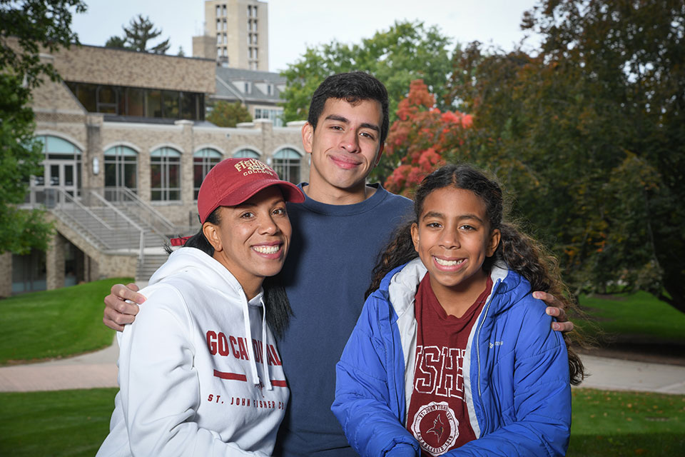 A Fisher family sits for a portrait.