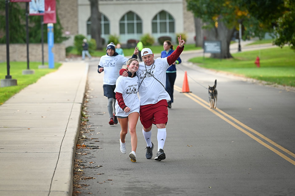 Members of the Fisher community run in the annual Teddi Trot.