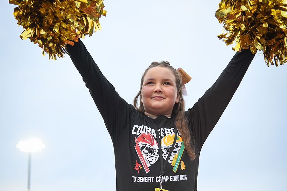 Karleigh Sackett served as an honorary cheerleader during the Courage Bowl.