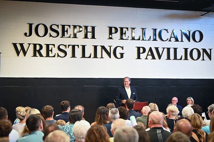 Trustee and alumnus Bill Pellicano offers remarks during a dedication of the Joseph Pellicano Wrestling Pavilion.
