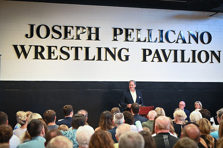 Trustee and alumnus Bill Pellicano offers remarks during a dedication of the Joseph Pellicano Wrestling Pavilion.