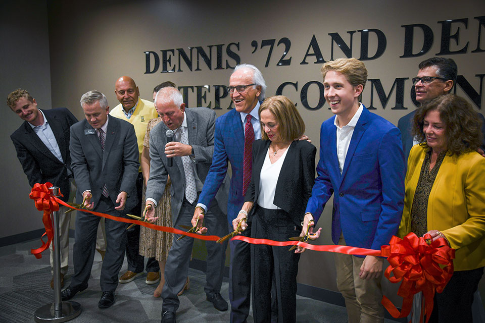 On the eve of Alumni Weekend, members of the campus community gathered to officially dedicate the Dennis ’72 and Denise Tepas Commons and the Terrace at Tepas Commons in honor of the Fisher family whose significant philanthropy made the transformation of the student community space possible.