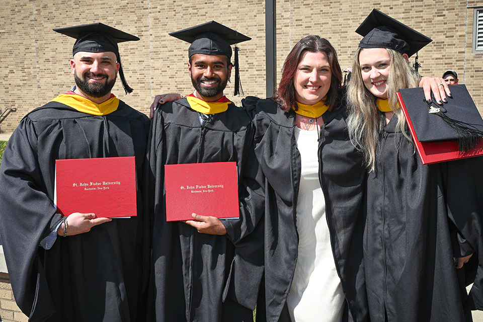 Graduates of the Wegmans School of Nursing celebrate at Commencement.