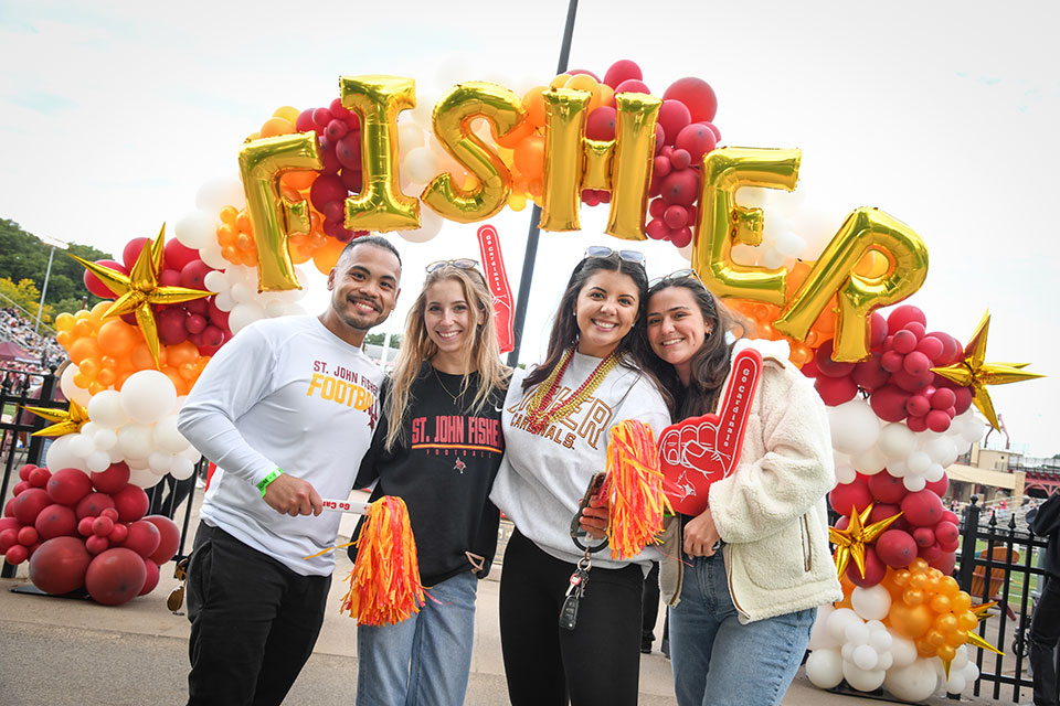 A group of Fisher graduates enjoy Alumni Weekend festivities.