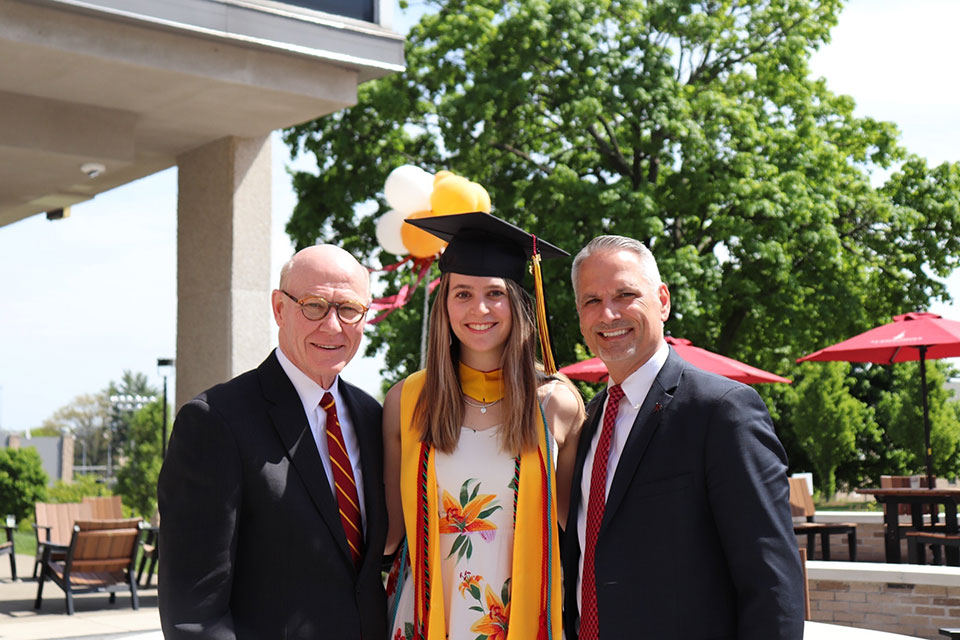 President Rooney, Jennah Ferrari, Jose Perales at Commencement.