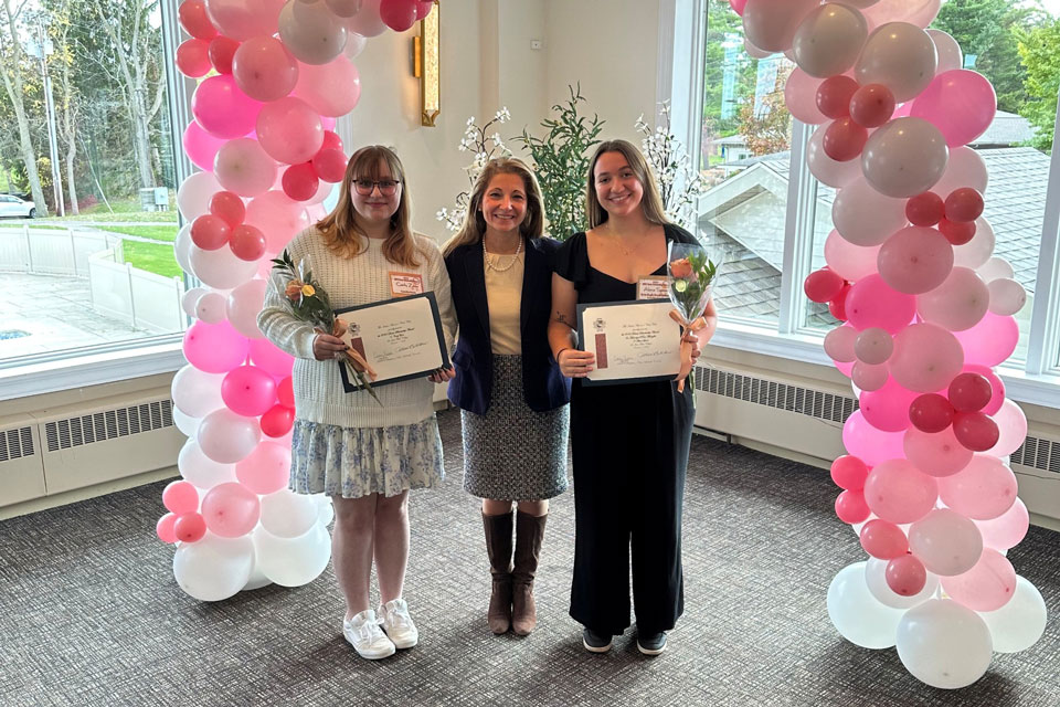 Dante Scholars Alana Spano and Carly Zona with Stella Plutino.