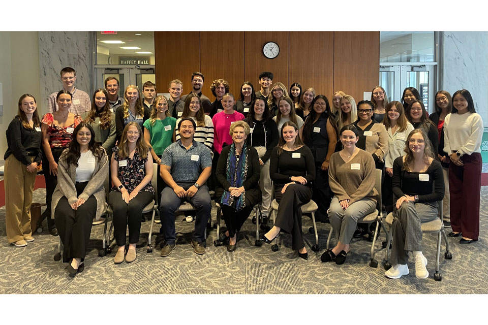 Fisher students pose with Lucy Malmberg.