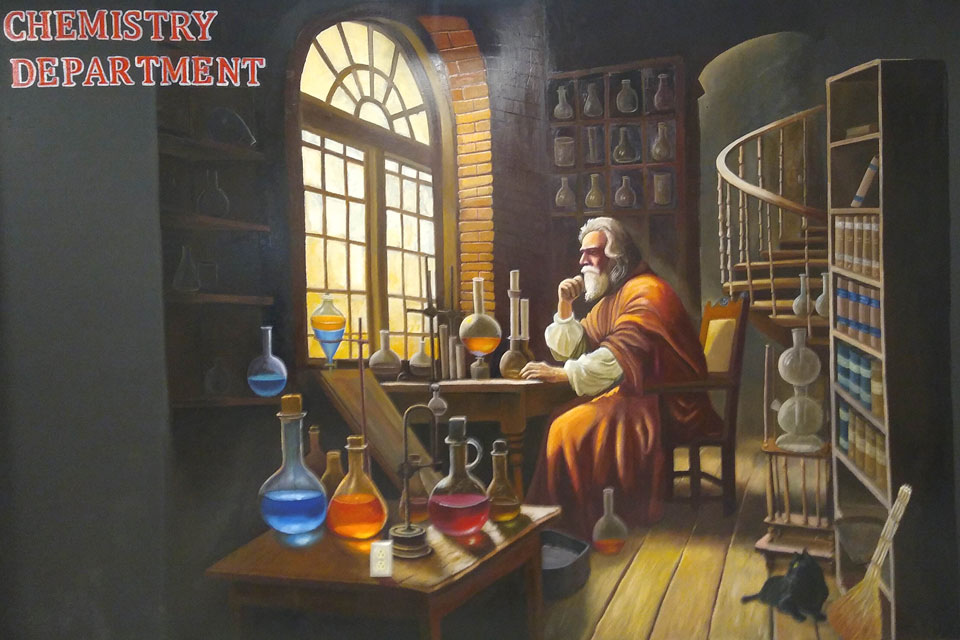A new mural in the Chemistry wing of the Skalny Science Building features a medieval chemist at work.