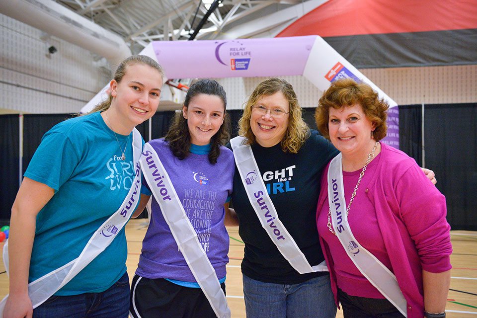 Cancer survivors walk a lap during the 2018 Relay for Life.