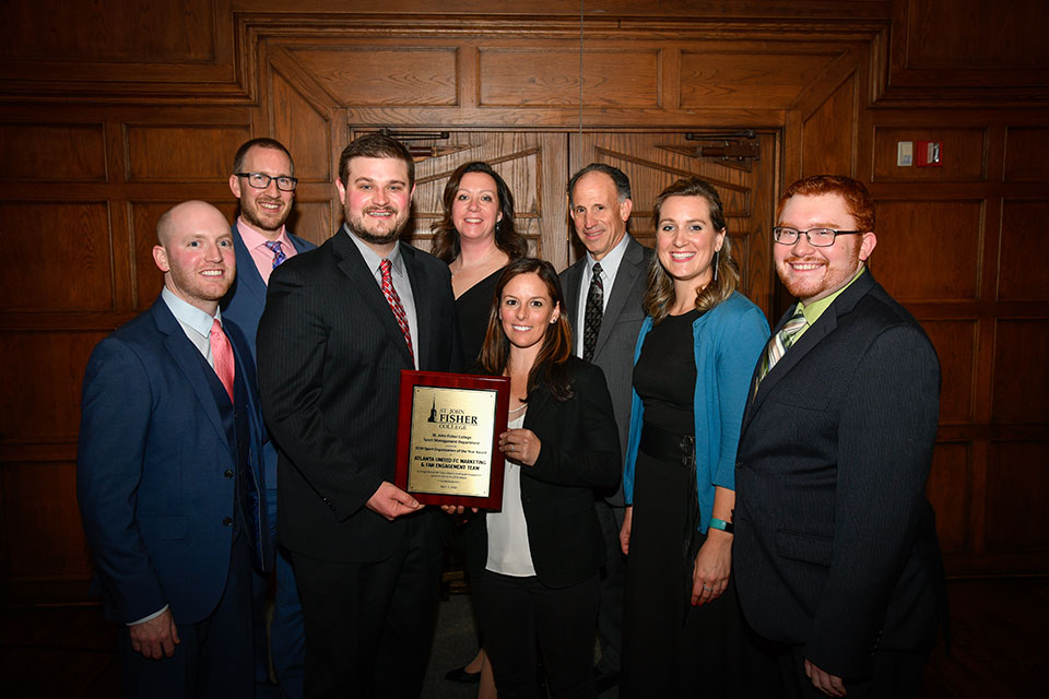 Sarah Kate “Skate” Noftsinger (center), the Club’s director of marketing and fan engagement, accepted the Sport Organization of the Year Award on behalf of the team. 