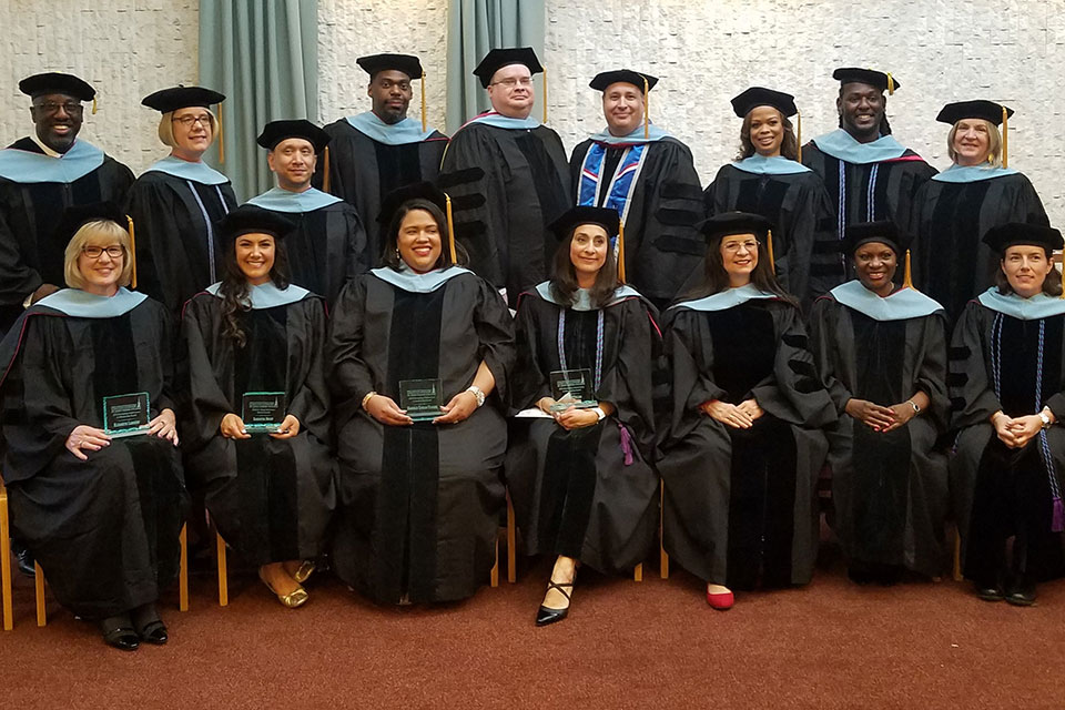  St. John Fisher College Ralph C. Wilson, Jr. School of Education hosted a hooding and awards ceremony for 13 candidates in the Doctoral Program in Executive Leadership.