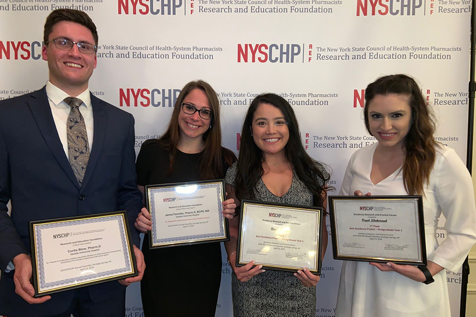 Jenna Fancher (second from the left) earned an award for her original research project.