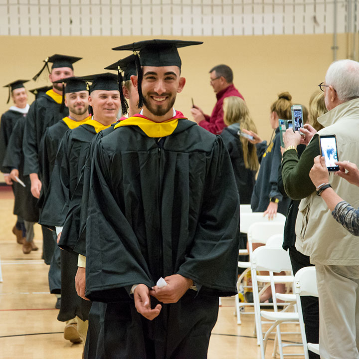 Graduating senior Anthony Loussedes leads the procession during the Student-Athlete Commencement Ceremony.