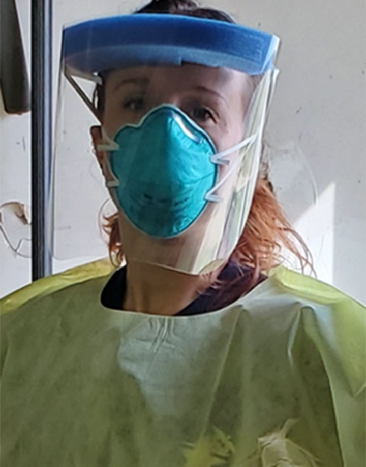 Joy Snyder in personal protective equipment for her work with the Monroe County Department of Health..