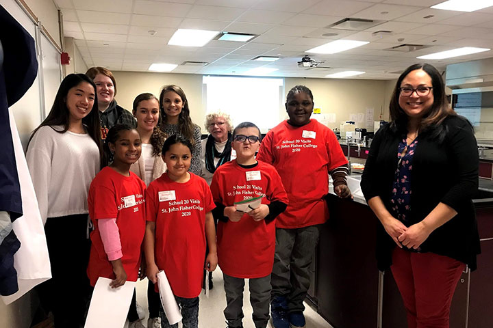 Fisher faculty and students with fourth-graders from School No. 20.