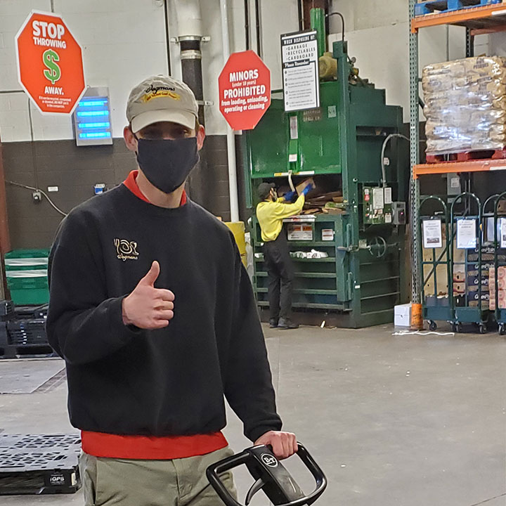 Egan Sicker works in the produce department at the Penfield Wegmans, a job he has held for 18 months. 