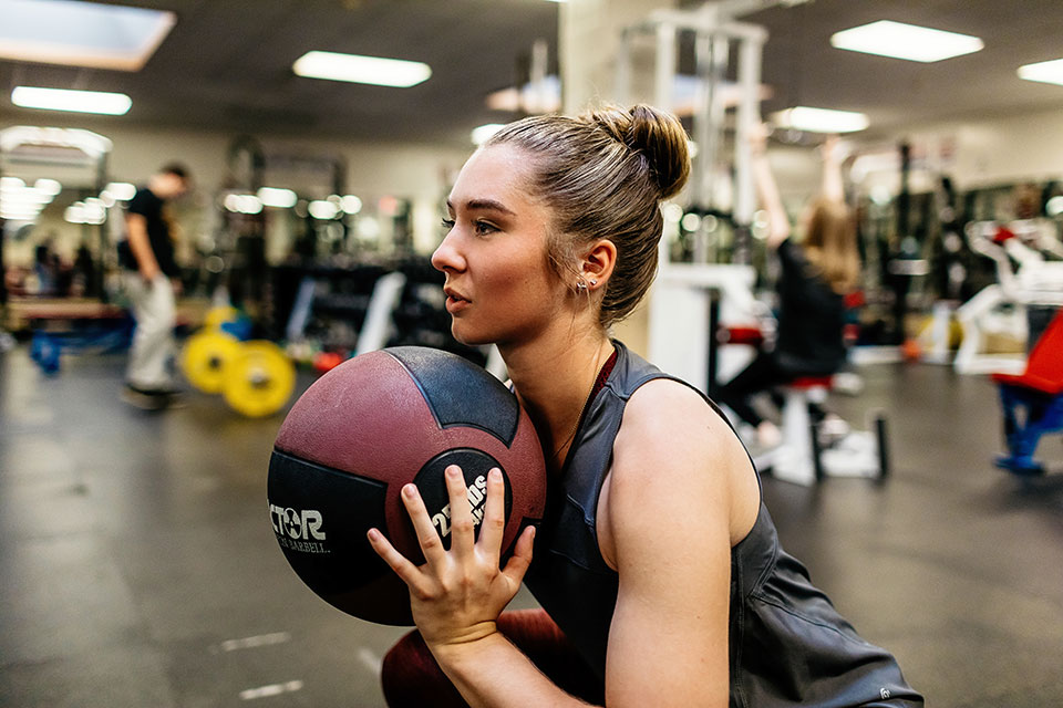 A student works out in the Ralph C. Wilson, Jr. Athletic Center.