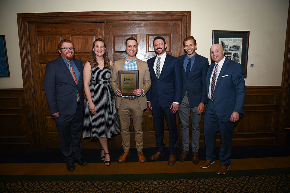 Members of the Sport Management program faculty with Sport Manager of the Year Bryan Karns, director of the 2023 PGA Championship. 