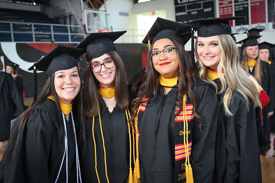 Students at a 2022 school-based Commencement ceremony.