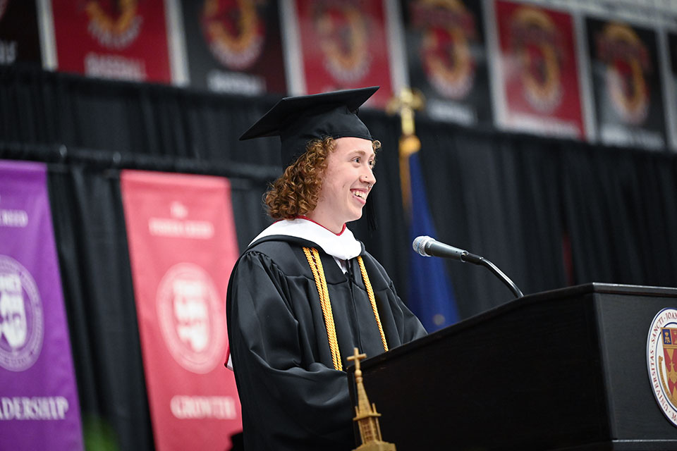 Marcus Lindenburg offers remarks on behalf of his fellow gradutes.