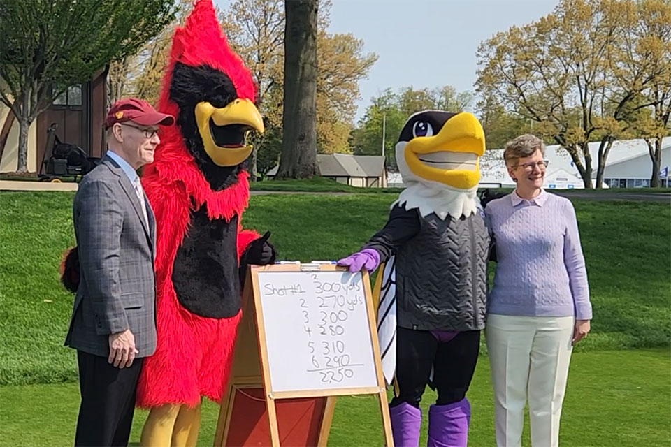 President Rooney, Cardinal, Swoop the Golden Flyer, and President Paul