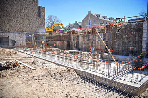 Crews work on the exterior of Lavery Library.