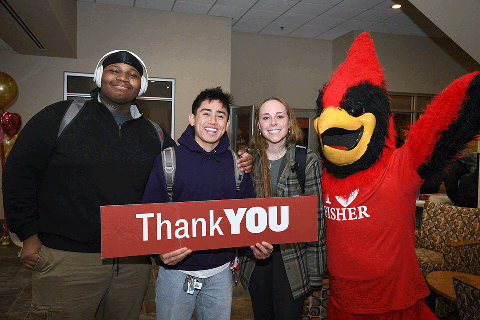 Students celebrate I Heart Fisher Day with Cardinal.