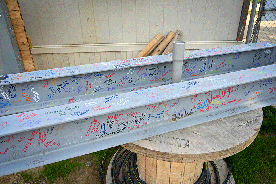 Members of the campus community signed a beam that will be used in the Lavery Library renovations.