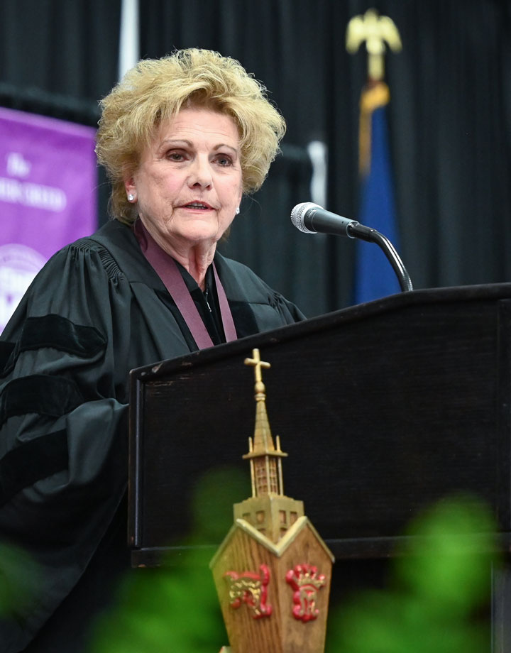 Lucy Malmberg offers remarks.
