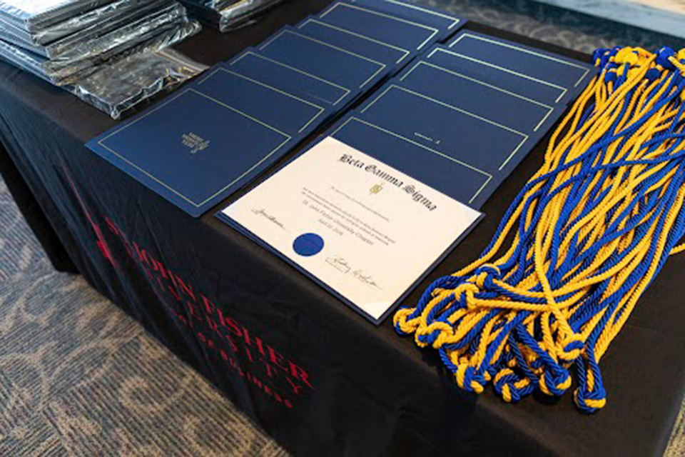 Beta Gamma Sigma Certificates and Cords.