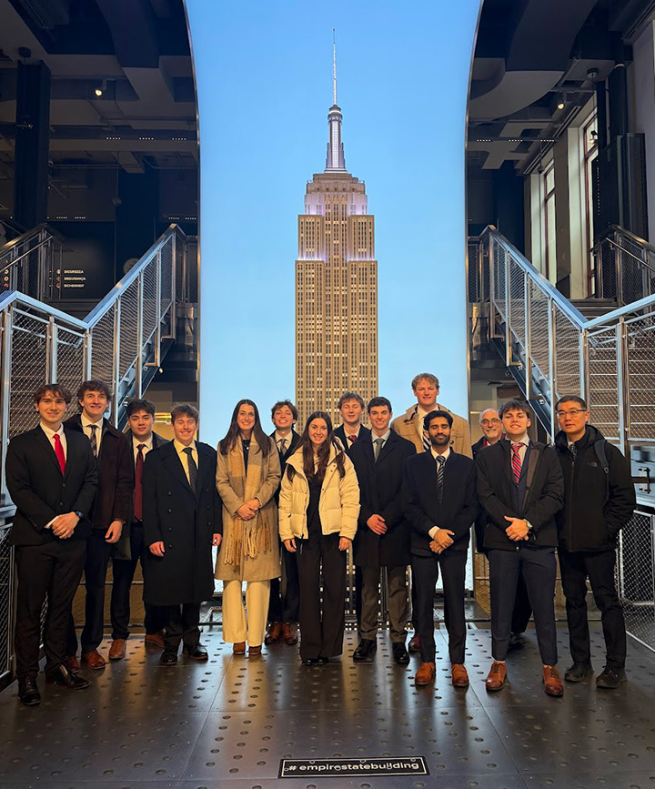 Fisher Investment Club in NYC with the Empire State Building behind them.